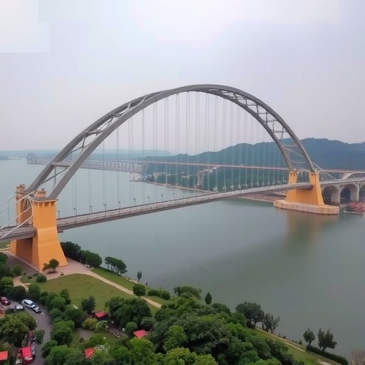 世界最大跨径悬浇拱桥――古金高速水落河特大桥完成拱圈合龙(图1) 世界最大跨径悬浇拱桥――古金高速水落河特大桥完成拱圈合龙(图1)